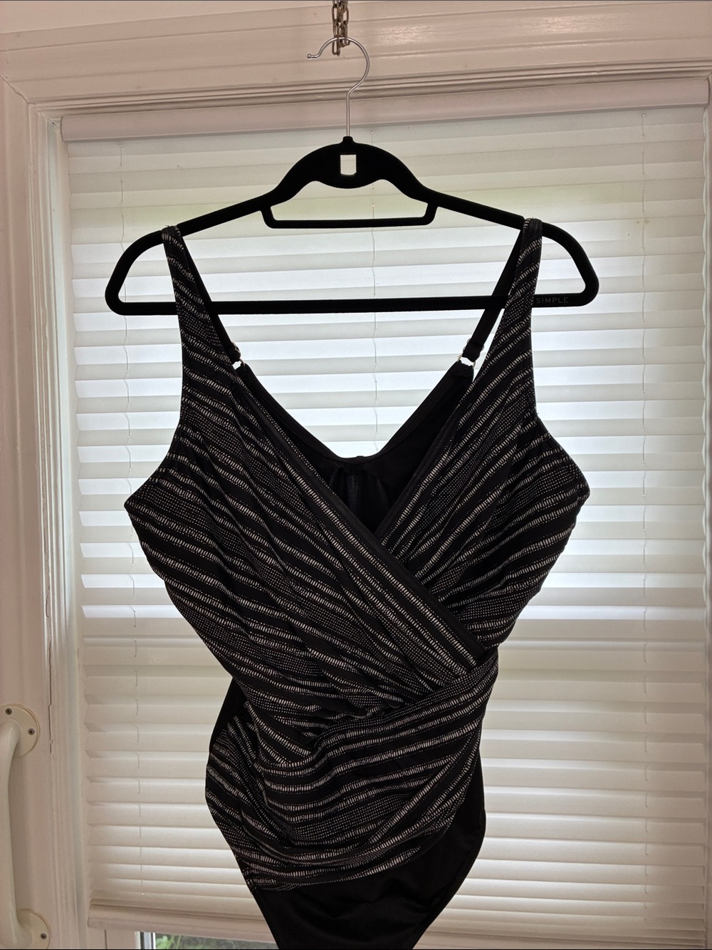 Black and white miraclesuit brand one piece swimsuit